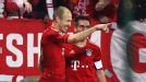 Arjen Robben celebrates after doubling Bayern's advantage at Marseille