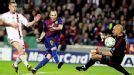 Andres Iniesta lifts the ball past Christian Abbiati to make it 3-1 to Barca.