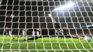 Christian Abbiati is helpless to stop Lionel Messi's first penalty of the night.