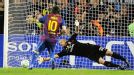 Lionel Messi beats Christian Abbiati's outstretched hand to give Barcelona the lead.