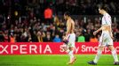 Robinho and Zlatan Ibrahimovic trudge off after their defeat at Camp Nou.