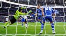 John Terry clears off the line from Rafael van der Vaart's effort