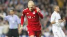 Arjen Robben celebrate after scoring a vital penalty for Bayern at the Bernabeu, making it 3-3 on aggregate.