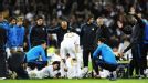 Jose Mourinho speaks to his players before extra-time begins.