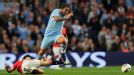 Park Ji-Sung attempts to dispossess former team-mate Carlos Tevez