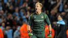 Joe Hart celebrates as the final whistle blows at the Etihad