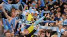Manchester City fans celebrate their 1-0 victory amid jubilant scenes
