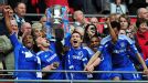 Chelsea players celebrate lifting the FA Cup after beating Liverpool