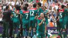 Going for gold: Mexico's players celebrate their famous victory