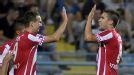 Tim Matavz and Kevin Strootman celebrate during PSV's 5-0 over Zeta