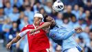 QPR goalscorer Bobby Zamora battles with Joleon Lescott