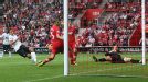 Robin van Persie scores his and Manchester United's second goal