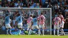 Peter Crouch puts Stoke into the lead as the Man City defence appeal in vain for a handball