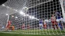 Benedikt Howedes scores to put Schalke into the lead against Olympiakos