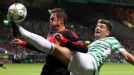 Celtic's Charlie Mulgrew challenges Benfica's Vieira Jardel