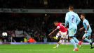 Arsenal's Alex Oxlade-Chamberlain scores his side's second goal of the game