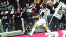 Andrea Pirlo celebrates after netting against Roma