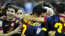 Barcelona celebrate David Villa's late, late winner at Sevilla