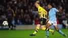 Marco Reus of Borussia Dortmund scores against Man City