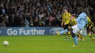 Mario Balotelli scores from the penalty spot against Borussia Dortmund