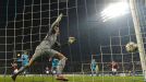 Zenit goalkeeper Vyacheslav Malafeev has to pick the ball out of his net