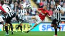 Manchester United goalscorer Tom Cleverley battles for the ball with Davide Santon