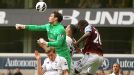 Hugo Lloris punches clear on his Premier League debut
