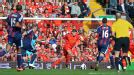 Steven Gerrard runs with the ball at the Stoke defence