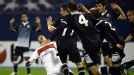 Dinamo Zagreb players protest their innocence as PSG's Jeremy Menez claims a foul