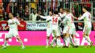 Bayer Leverkusen celebrate Sydney Sam's late winner at Bayern