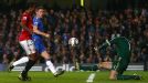 Nani dinks the ball over Petr Cech to make it 3-2 to Manchester United