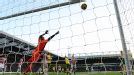 Asmir Begovic is powerless to stop Bradley Johnson's header from finding the back of the net