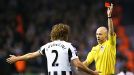 Fabricio Coloccini is dismissed by referee Anthony Taylor for his challenge on Luis Suarez