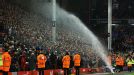 Liverpool fans are accidently soaked at half-time when a sprinkler went off