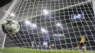 Theo Walcott turns to celebrate after scoring Arsenal's opener away to Schalke