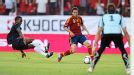 Felipe Baloy leaves the ground to make a tackle on Jordi Alba 