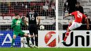 Ezequiel Garay fires home Benfica's winner over Celtic, leaving Group G on a knife-edge