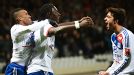 Lyon celebrate after Bafetimbi Gomis scored what proved to be Lyon's winner at home to Montpellier