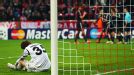 BATE goalkeeper Andrey Gorbunov is crestfallen after Thomas Muller scored Bayern's second goal