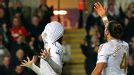 Michu shows his frustration as he sees a goal disallowed that would have levelled the scores at 3-3