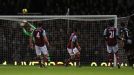 Glen Johnson watches on as his strike gives Liverpool the lead against West Ham