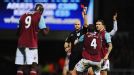 Referee Anthony Taylor shows West Ham striker Carlton Cole a red card