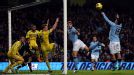 Edin Dzeko and Sergio Aguero attempt to make a connection as Manchester City battle to break down Reading