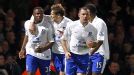 Victor Anichebe celebrates with his team-mates after netting an equaliser for Everton