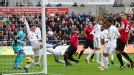 Patrice Evra heads home to give Manchester United the lead at Swansea
