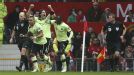Papiss Cisse and his Newcastle team-mates celebrate a goal against Manchester United at Old Trafford