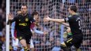 Ivan Ramis celebrates after giving Wigan the early lead at Aston Villa