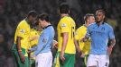 Samir Nasri squares up to Sebastien Bassong before receiving a red card
