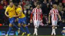 Southampton's Rickie Lambert and Jay Rodriguez celebrate taking a 3-1 lead at Stoke through Andy Wilkinson's own goal