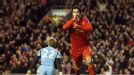 Luis Suarez celebrates his second goal and Liverpool's third against Sunderland